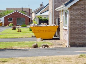 Small Rubbish Skip on a Housing Estate